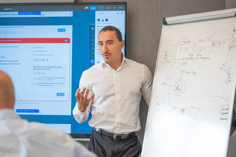 Mikki Kobvel, Timeleft’s CTO, is presenting in a conference room.