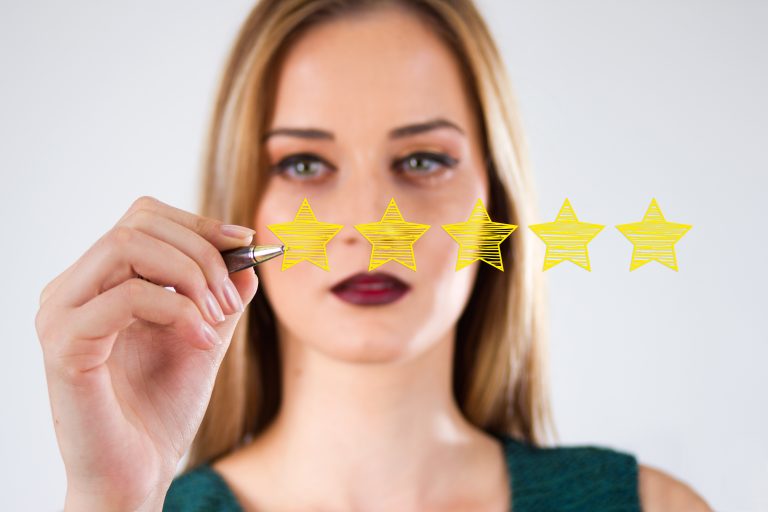 A software developer draws five stars to indicate her rating in a review
